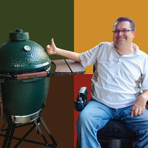 Collin, founder of WheelyQ Barbecue, sitting in a wheelchair next to a big green egg.