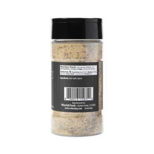A bottle of WheelyQ Barbecue SPG Seasoning (Salt, Pepper, Garlic) showing the right.