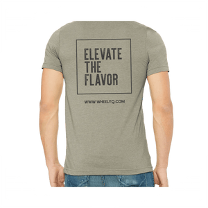 A heather stone colored t-shirt with the Elevate The Flavor logo and www.wheelyq.com on the back.