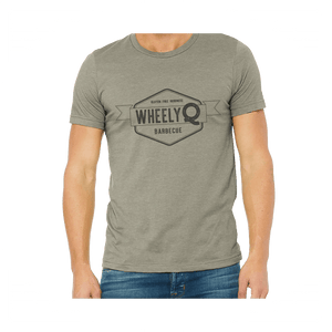 A heather stone colored t-shirt with the WheelyQ Barbecue logo on the front.